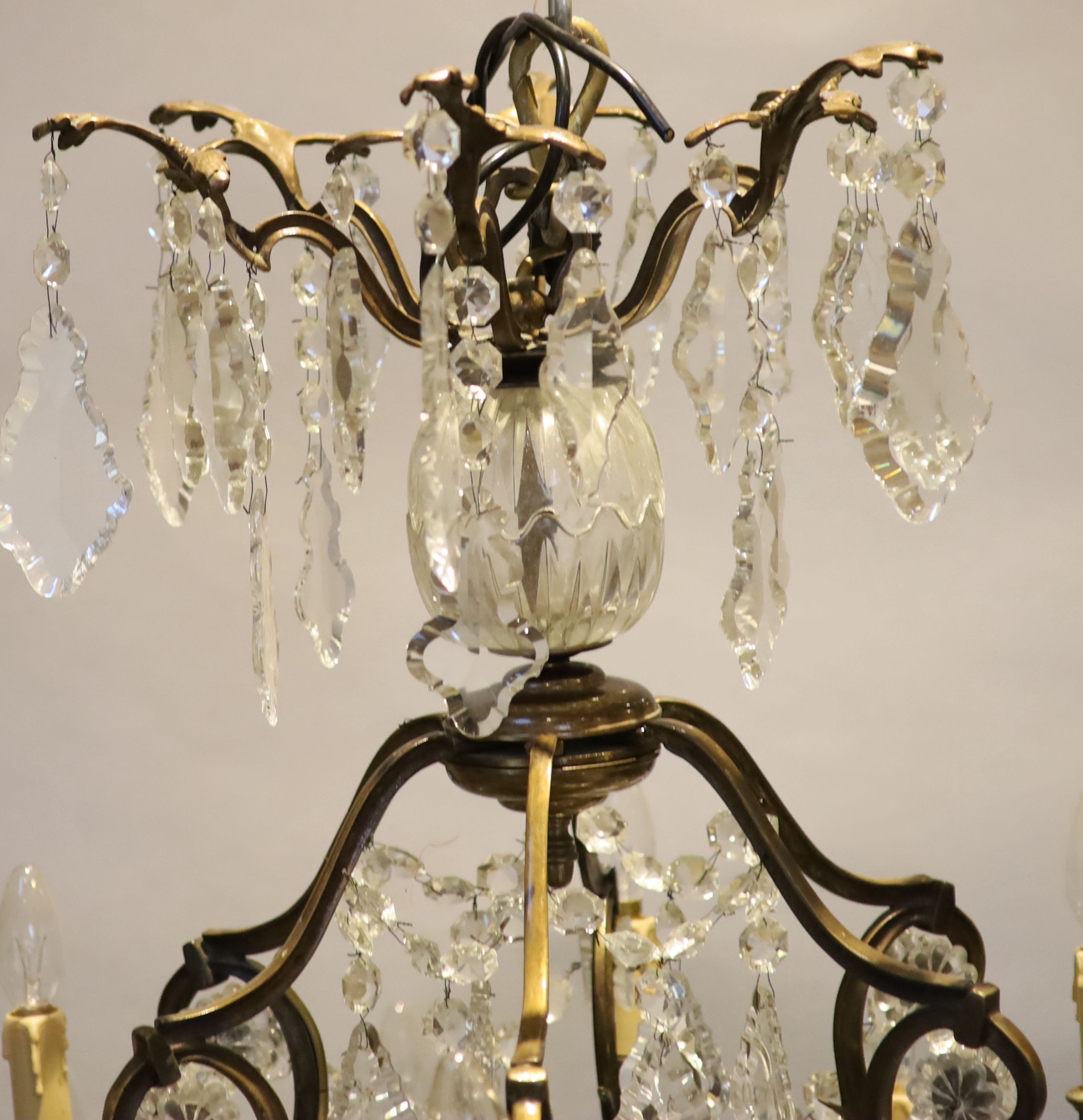 An 18th century style bronzed metal, cut glass 30 light chandelier by Christopher Wray, approximately 123 cm high